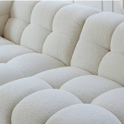 Close-up of Boxy Cloud Sofa tufted upholstery in off-white boucle fabric, highlighting premium texture and luxury sofa design for UAE homes.